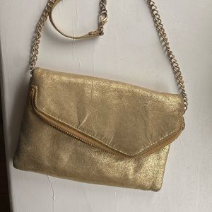 Hobo gold envelope clutch/cross body with purple interior